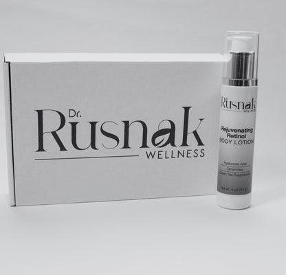 Dr Rusnak Wellness Anti-Aging Body Moisturizer with Retinol bottle with packaging on a gray background