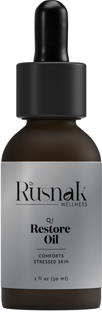 Dr. Rusnak Wellness QJ Restore Oil bottle with dropper on a white background